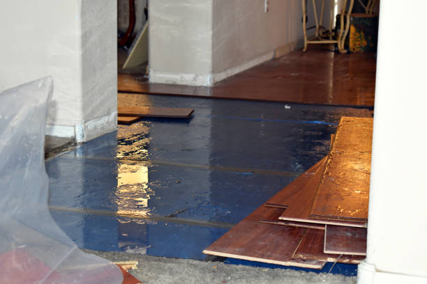 Professional Water Damage Restoration technician working in Macomb, OK